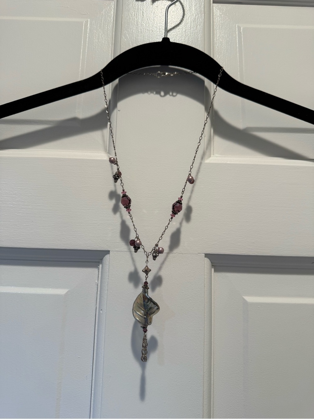 Elegant Silver Necklace with Pink Beads and Leaf Pendant